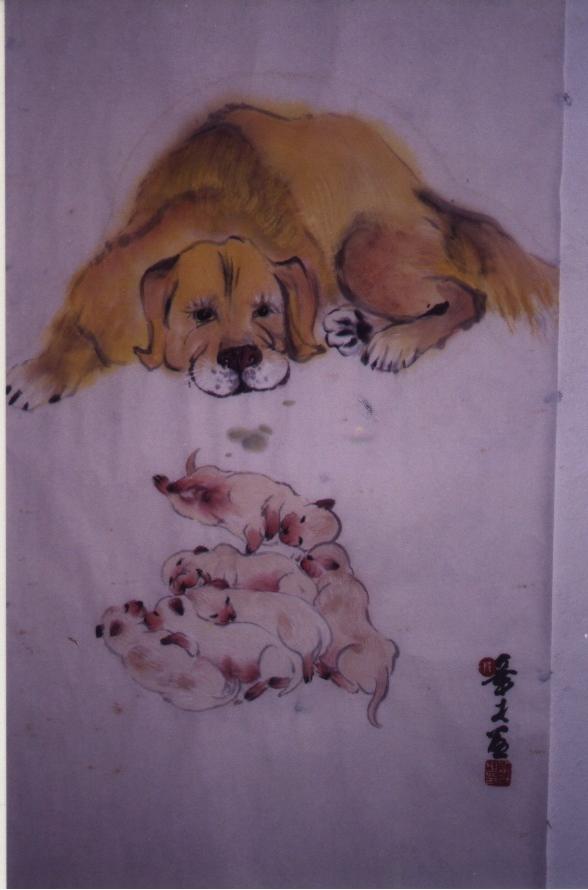 A Golden Retriever with her pups